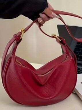 RED HAND BAG.